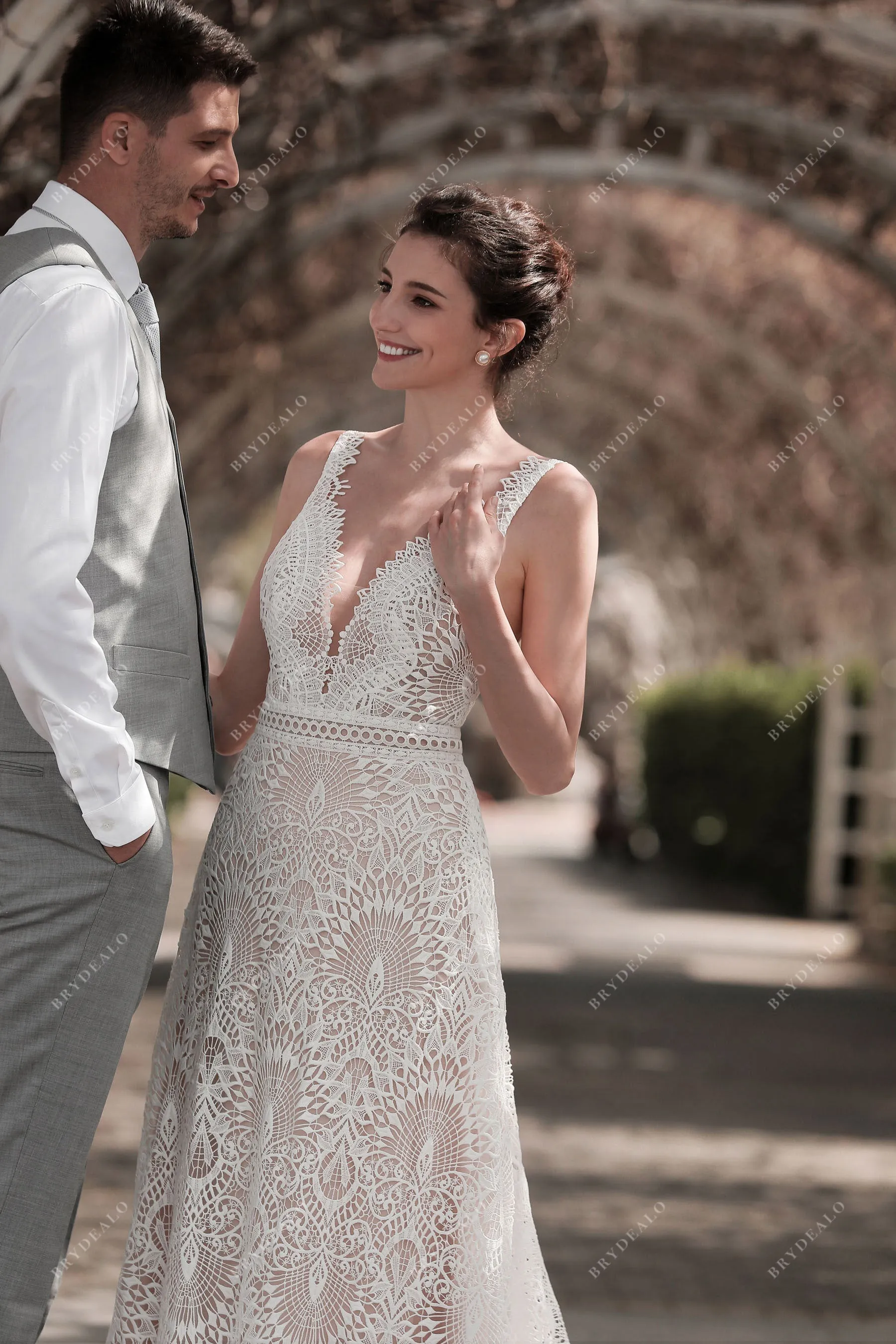 Plunging V-neck Sleeveless Whimsical Lace A-line Nude Wedding Dress